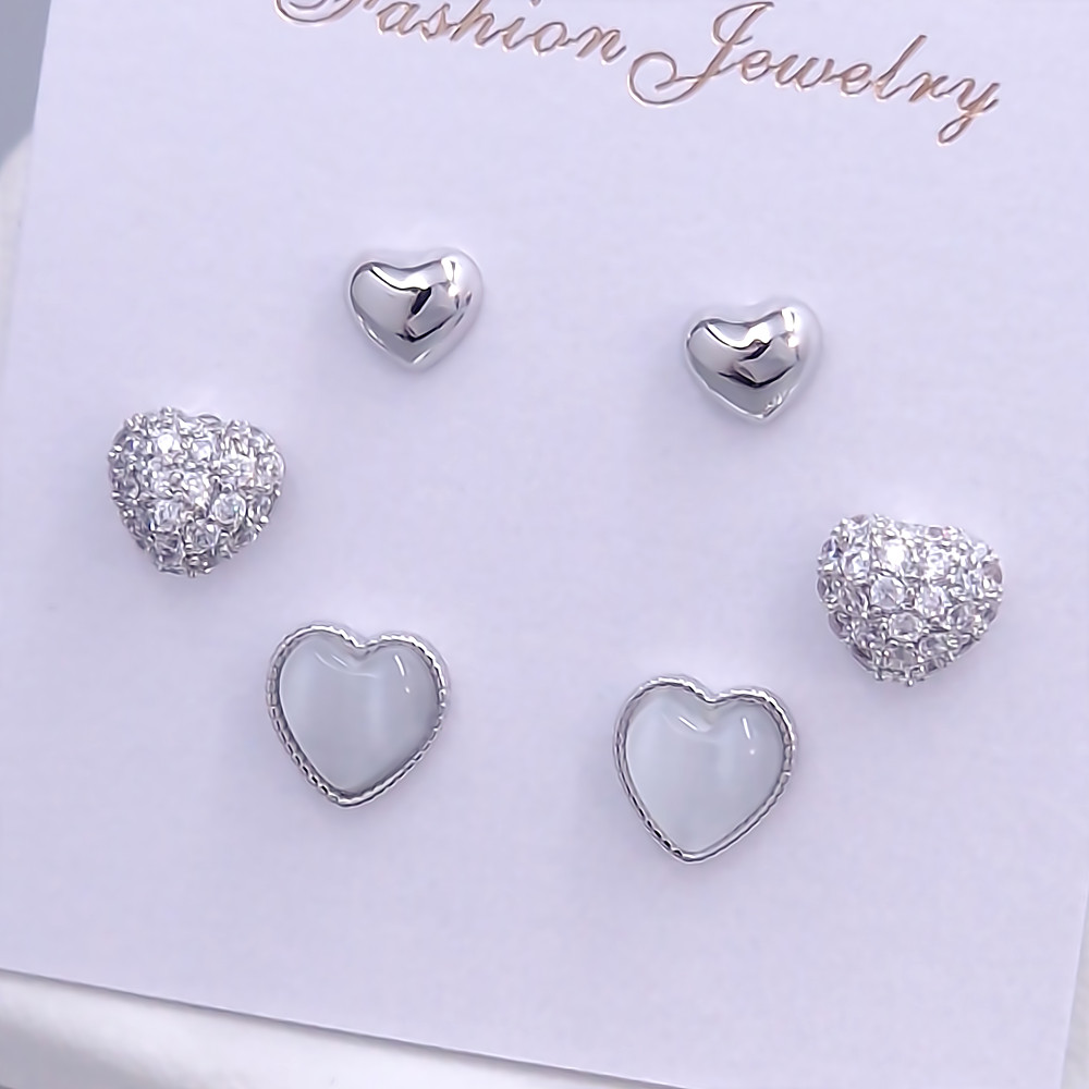 Набір із 3-х пар сережок-гвоздиків FJ. Родій. Камені: білий циркон