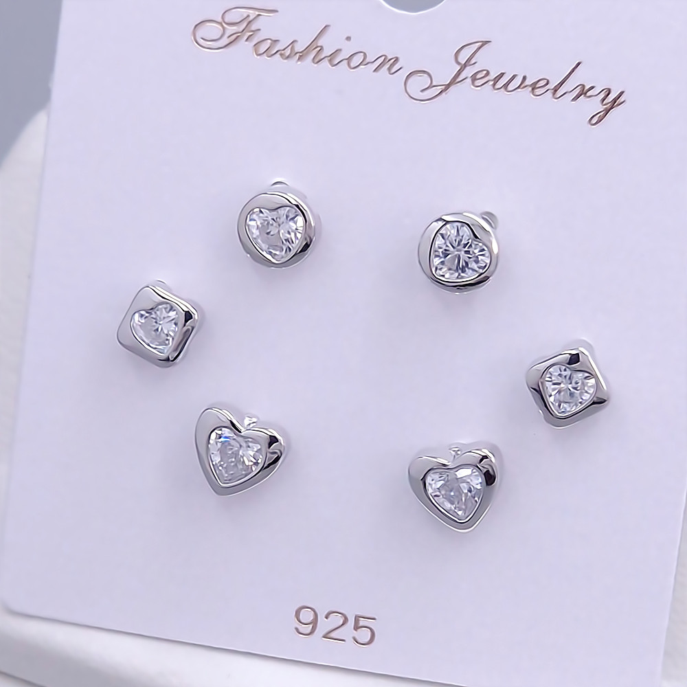 Набір із 3-х пар сережок-гвоздиків FJ. Родій. Камені: білий циркон