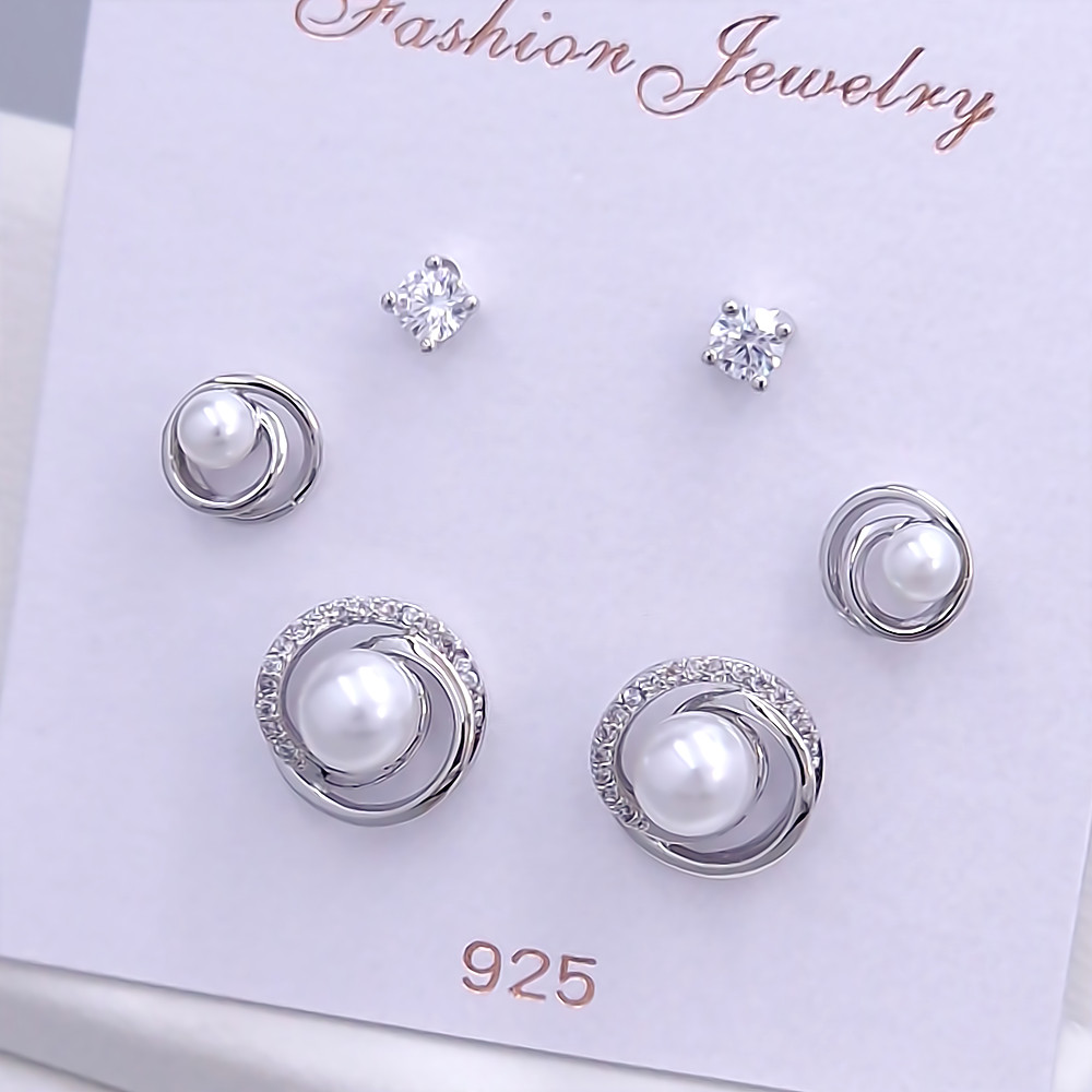 Набір із 3-х пар сережок-гвоздиків FJ. Родій. Камені: білий циркон і перли