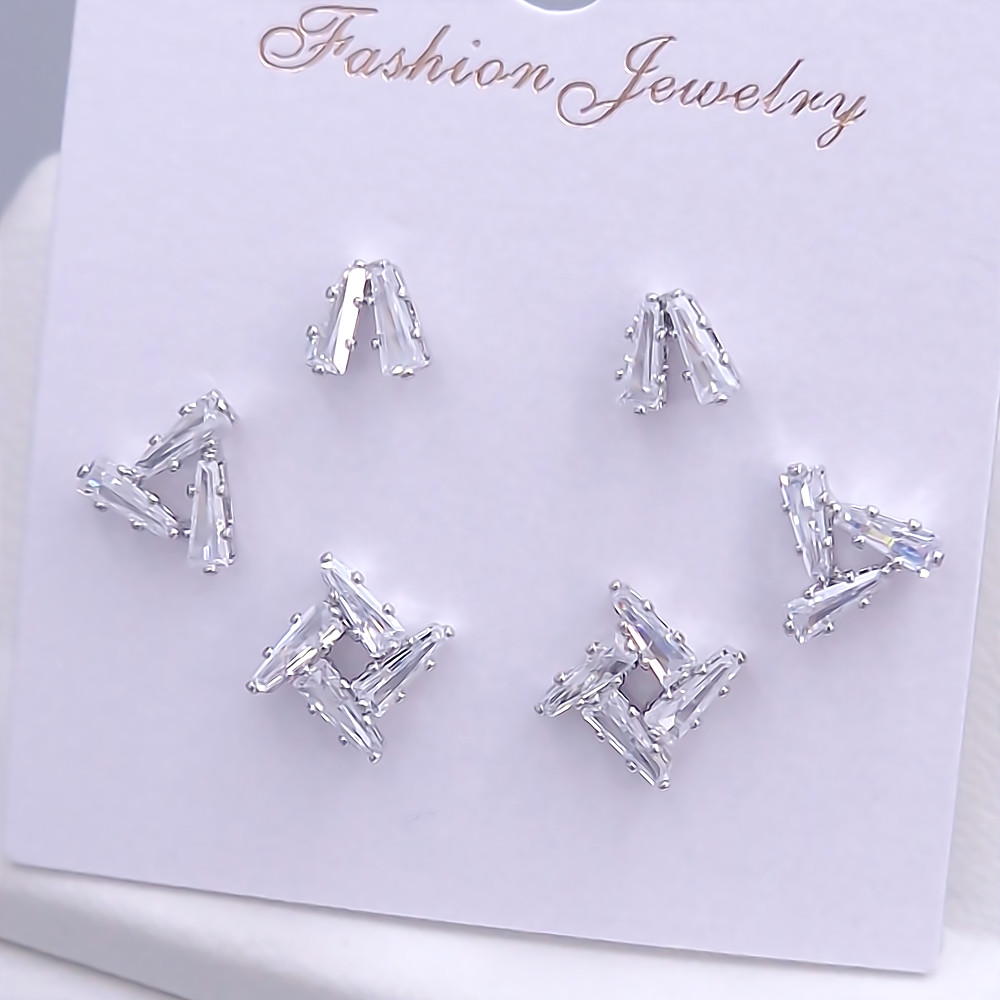 Набір із 3-х пар сережок-гвоздиків FJ. Родій. Камені: білий циркон