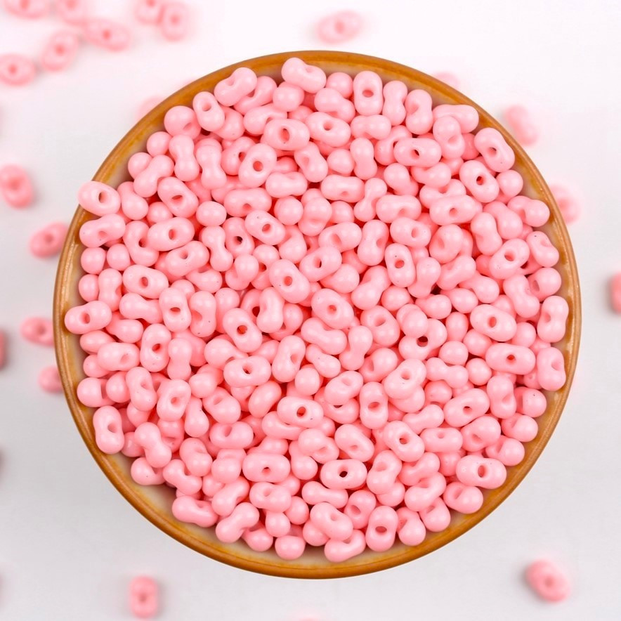 Бісер скляний у формі арахісу FARFALLE 6х4х3,2 мм 10 г Рожевий світлий, фото 1