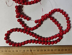 Нимистини керамічні червоні діаметр 10 мм на нитці