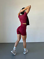 Жіночий костюм для фітнесу (спорту, залу, тренувань) кроп-топ та велосипедки з ефектом пуш-ап бордовий колір, розмір S