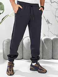 Чоловічі якісні та зручні спортивні зимові однотонні штани з начосом