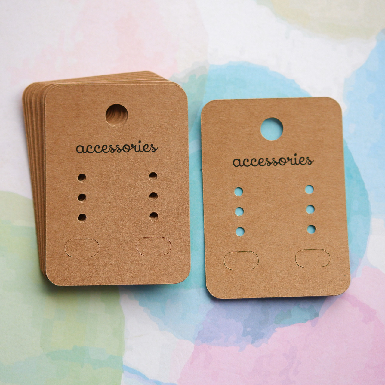 Планшетка 50х70мм, для сережок 6 отворів + 2 прорізи + 1 підвіс