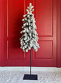 Ялинка Style Lux вузька лита на високому металевому стовбурі - підставці 160 см засніжена