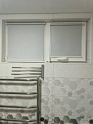 Рулонні штори Luminis 920 срібний колір, до 70% затемнення з фіксацією