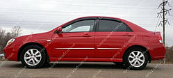 Вітровики вікон Кіа Церато 1 (дефлектори бічних вікон Kia Cerato 1)