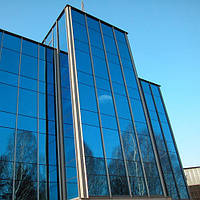 Архитектурное тонирование стёкол зеркальной солнцезащитной плёнкой Sun Control R Blue 15