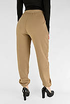 Жіночі зимові штани з полірованого велюру Штани на хутрі під манжет M-2XL Бежевий колір, фото 4