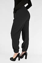 Жіночі зимові штани з полірованого велюру Штани на хутрі під манжет M-2XL Чорний колір, фото 3