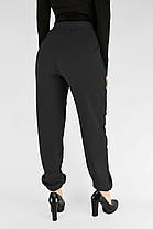 Жіночі зимові штани з полірованого велюру Штани на хутрі під манжет M-2XL Чорний колір, фото 5