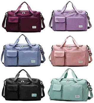 Сумка спортивна дорожня містка 44*28 см довгим ремінцем у різних кольорах Luna