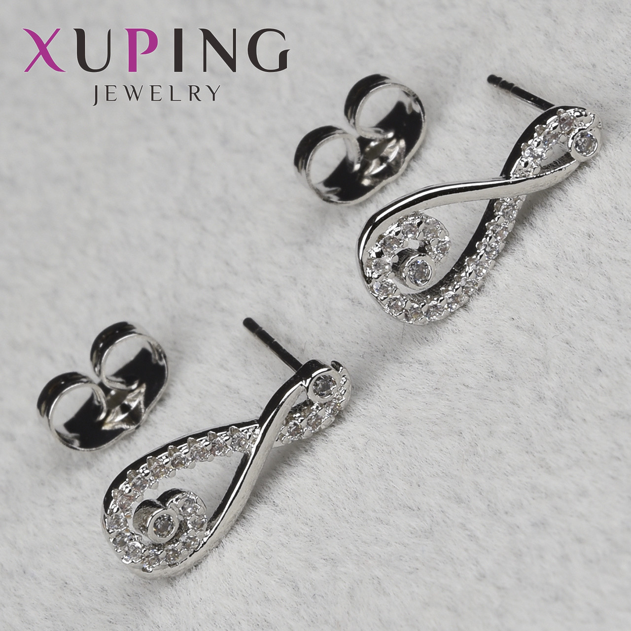 Серьги пуссеты гвоздики серебристого цвета размер 14х4 мм фирма Xuping Jewelry восьмёрочки со стразами