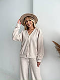 Бежевий утеплений жіночий костюм і ангори в рубчик на ґудзиках, фото 5