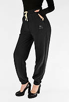 Жіночі зимові штани в рубчик (вельвет) Штани на хутрі під манжет M-2XL Чорний колір, фото 2