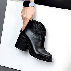 Дизайнерські чорні шкіряні ботильйони - універсальна елегантність