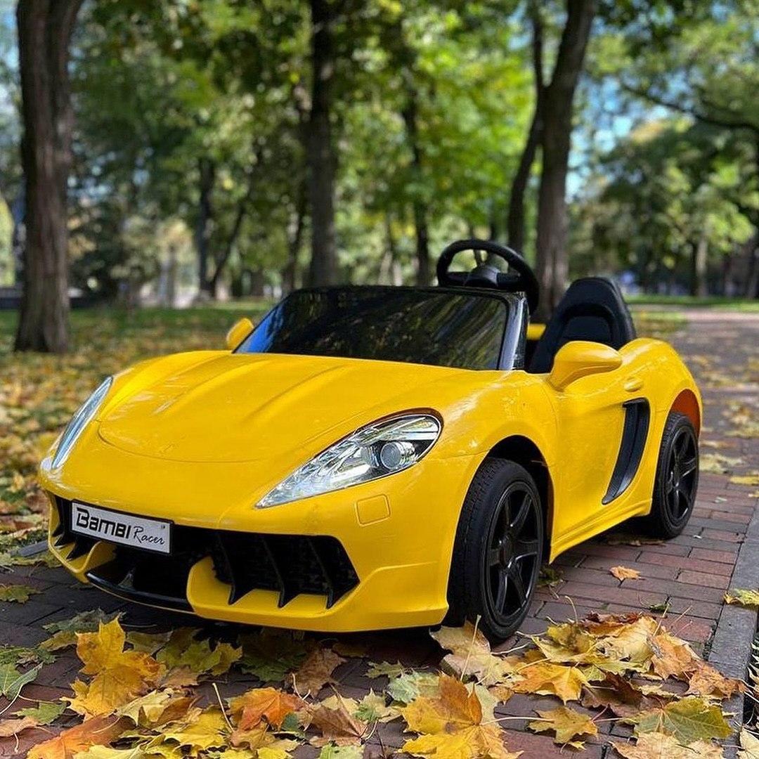 Дитячий електромобіль на акумуляторі Porsche M 4055 для дітей 3-8 років жовтий