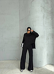 Стильний жіночий костюм із широкими брюками., фото 3