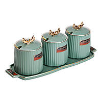 Набір їх 3 керамічних банок по 400 мл для зберігання сипучих продуктів на керамічній підставці зелений