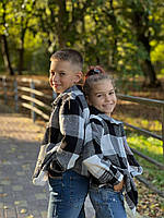 Детская рубашка в клетку утепленная без капюшона на пуговицах черно-белая