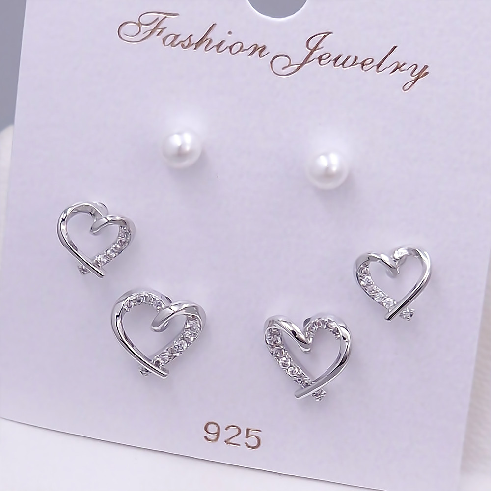 Набір із 3-х пар сережок-гвоздиків FJ. Родій. Камені: циркон та перли