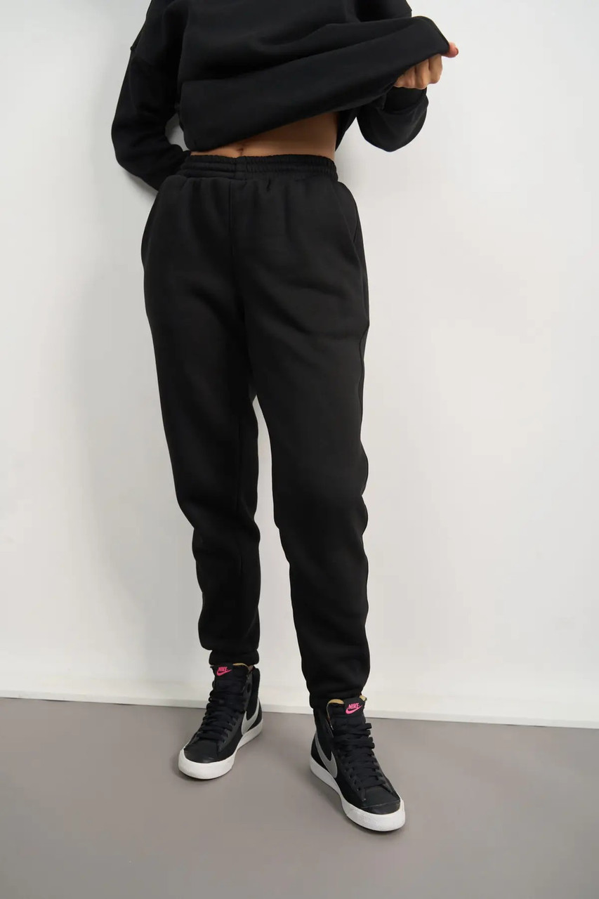 Жіночі зимові спортивні штани чорні на флісі на резинці, фото 1