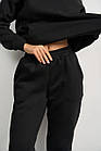Жіночі зимові спортивні штани чорні на флісі на резинці, фото 2