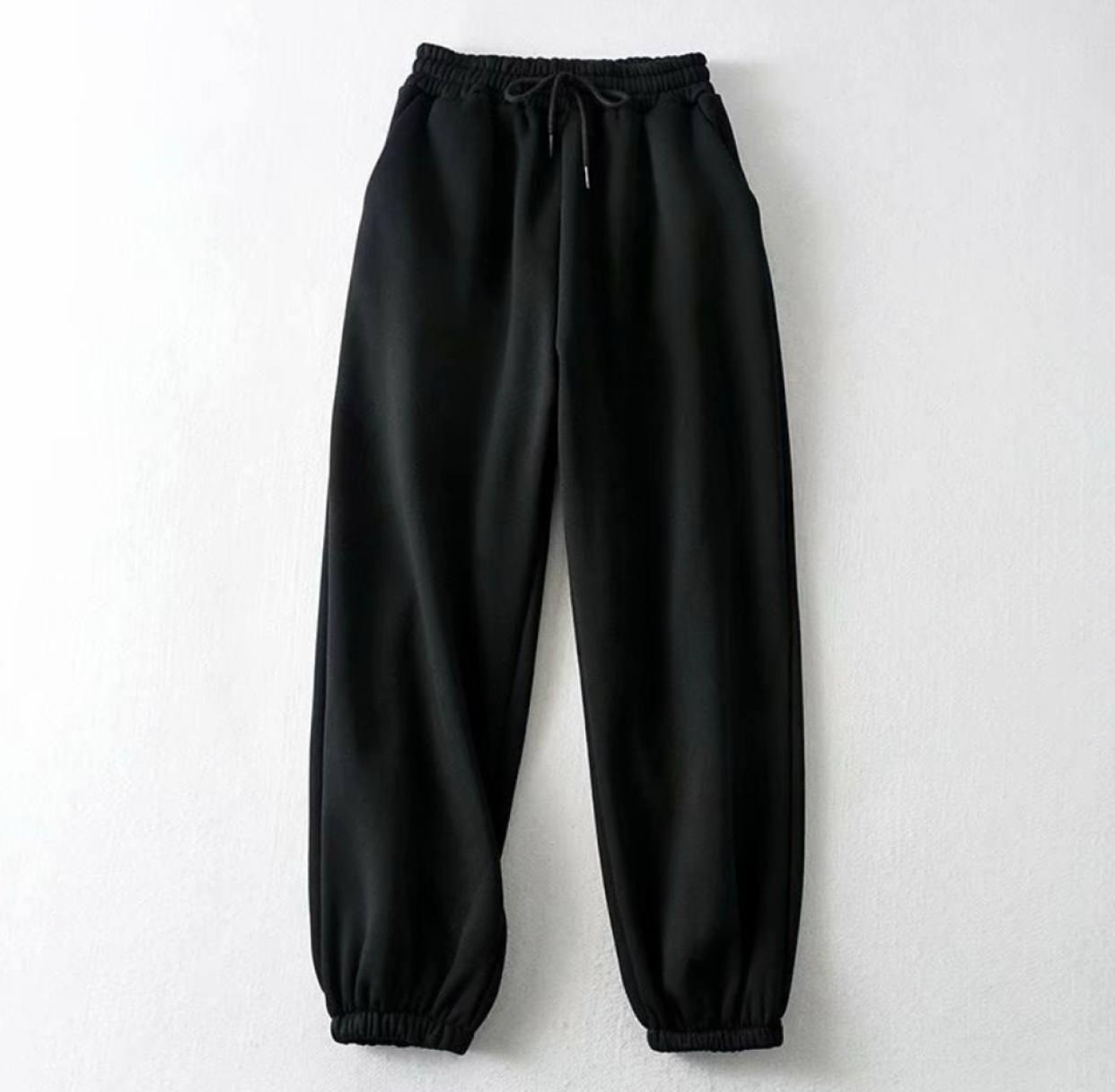 Жіночі зимові спортивні штани чорні на флісі на резинці, фото 1