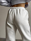 Жіночі зимові спортивні штани білі на флісі на резинці, фото 3