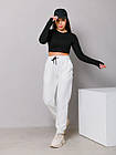 Жіночі зимові спортивні штани білі на флісі на резинці, фото 2