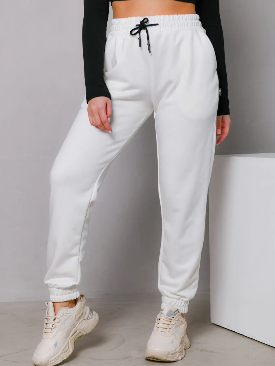 Жіночі зимові спортивні штани білі на флісі на резинці, фото 1