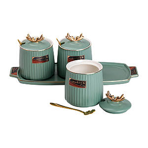 Набір їх 3 керамічних банок по 400 мл для зберігання сипучих продуктів на керамічній підставці зелений