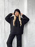 Чорний теплий жіночий спортивний костюм з об'ємним худі з турецької тринитки на флісі, фото 5