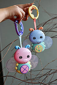 Музична підвіска на коляску Світлячок на прищепці