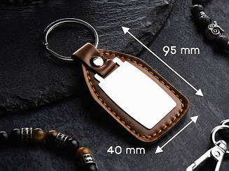 Брелок шкірзам, під гравіювання. Колір коричневий. 95х40мм