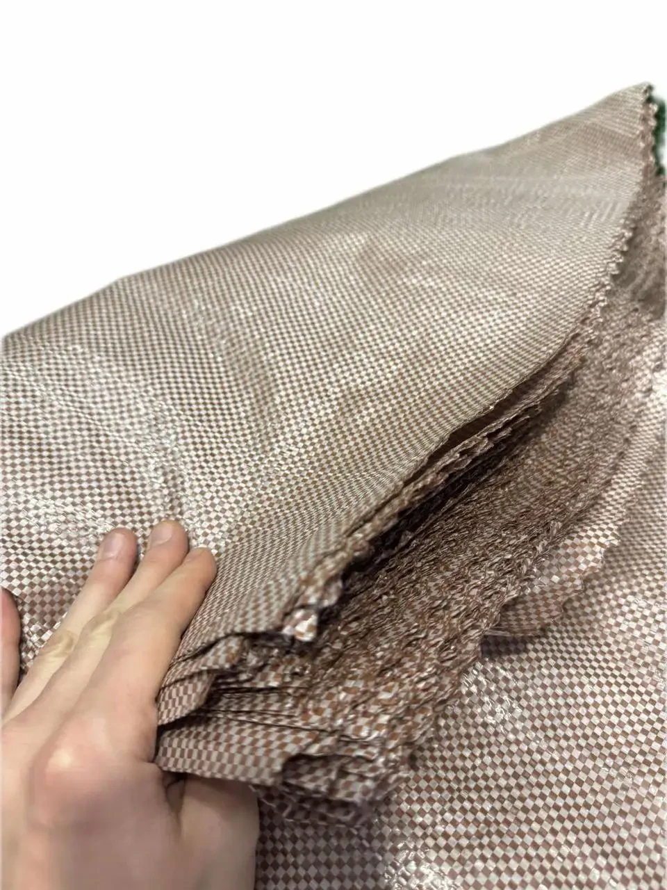 Коричневий поліпропіленовий мішок (хакі, камуфляж) 55х75см (50кг). Упаковка 100шт (62г/м2).