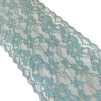 Стрейчеве (еластичне) мереживо м'ятного відтінку, шириною 22 см.