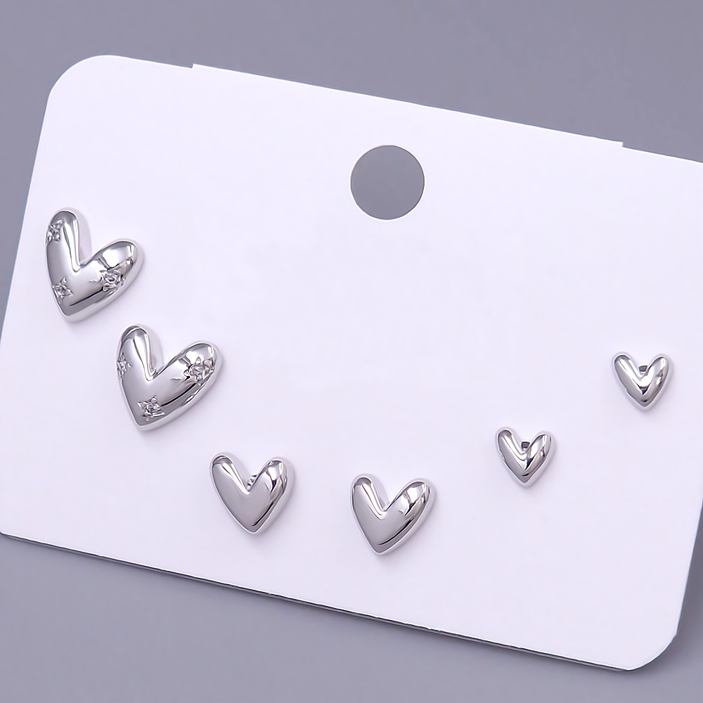 Набір із 3-х пар сережок-гвоздиків FJ. Родій. Камені: білий циркон