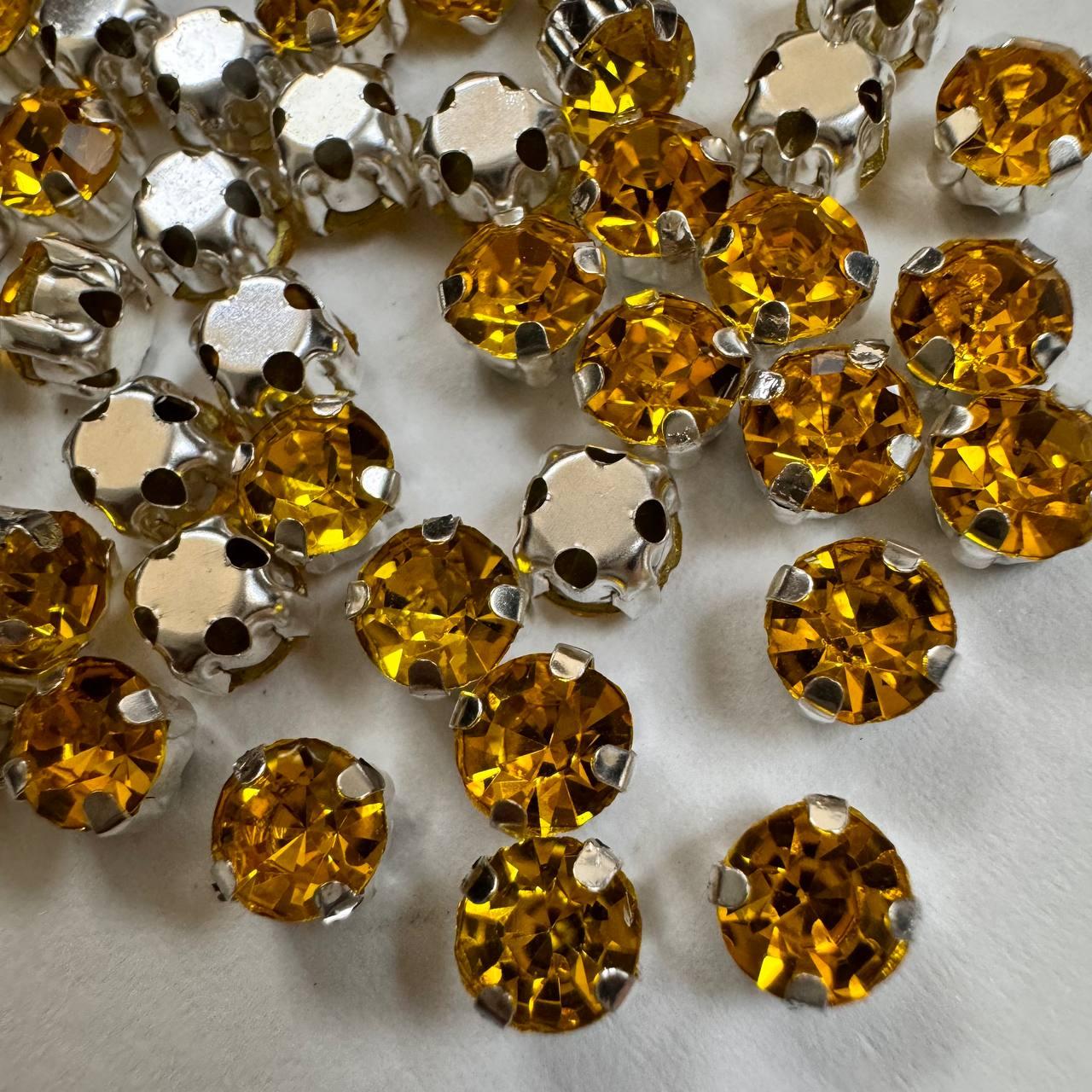 Круглі стрази (шатони) в цапах, розмір 5 мм, колір Topaz