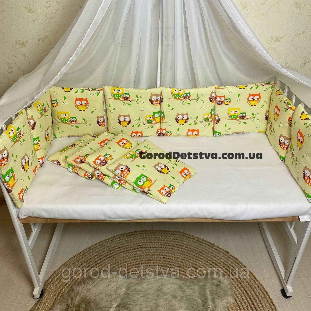 Захист 12 подушок бортики бампер на 4 сторони в дитяче ліжечко 120*60 см на зав'язочках висота 30 см, фото 1
