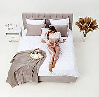 Ліжко подіум без підйомного механізму в м'якій оббивці з узголів'ям у каретній стяжці Borno Борно Novelty