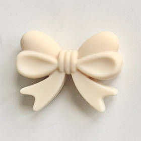 Бантик (бежевий) силіконові намистини