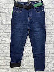 Жіночі утеплені сині джинси-мозавужені донизу