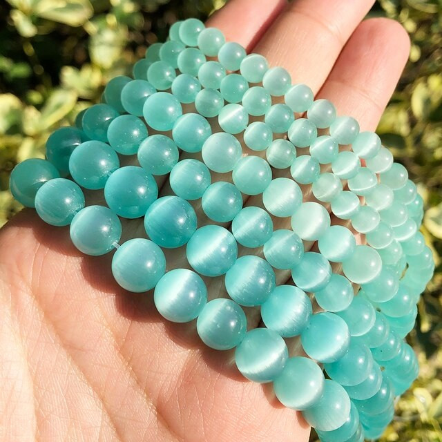 Котяче око 12 мм колір на фото приблизно 30 шт., довжина нитки 37 см