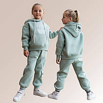 Утеплений дитячий спортивний костюм