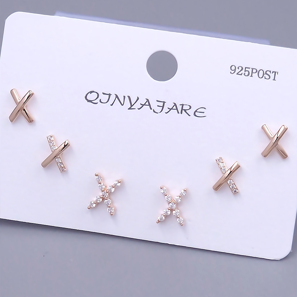 Набір із 3-х пар сережок-гвоздиків FJ. Позолота червоного відтінку. Камені: циркон