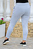 Жіночі теплі та зручні з начосом прогулянкові трикотажні штани з кишенями, батал великі розміри, фото 3