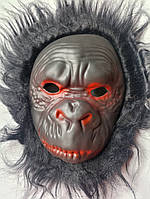 Маска в формі мавпи на голову і прорізами для очей.