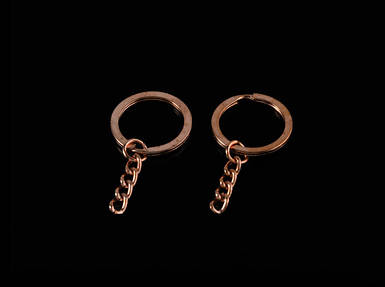 Плоске кільце з ланцюжком. Колір червоне золото. 25мм